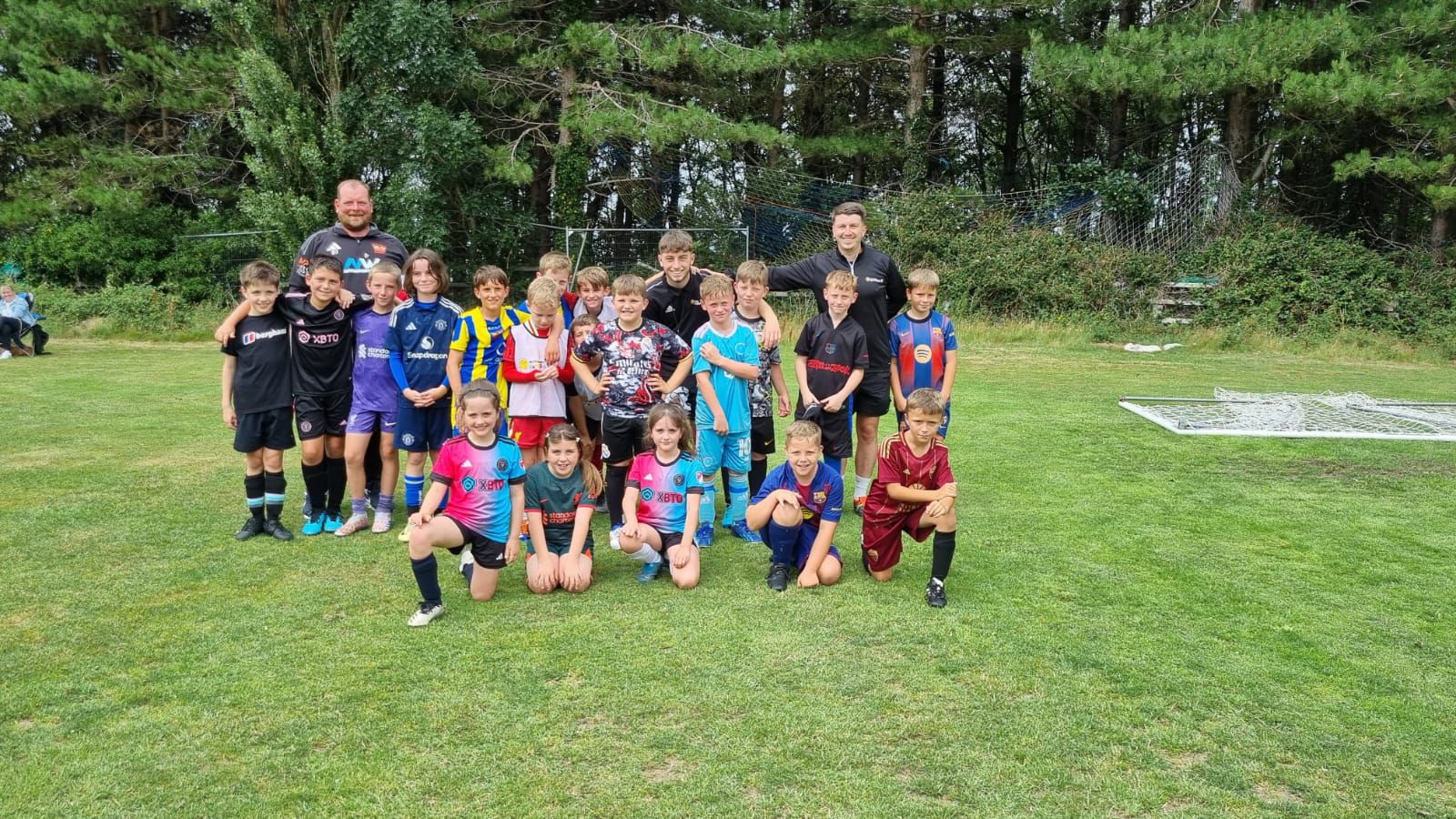 Dion Jones helping at a children's Fun Football session