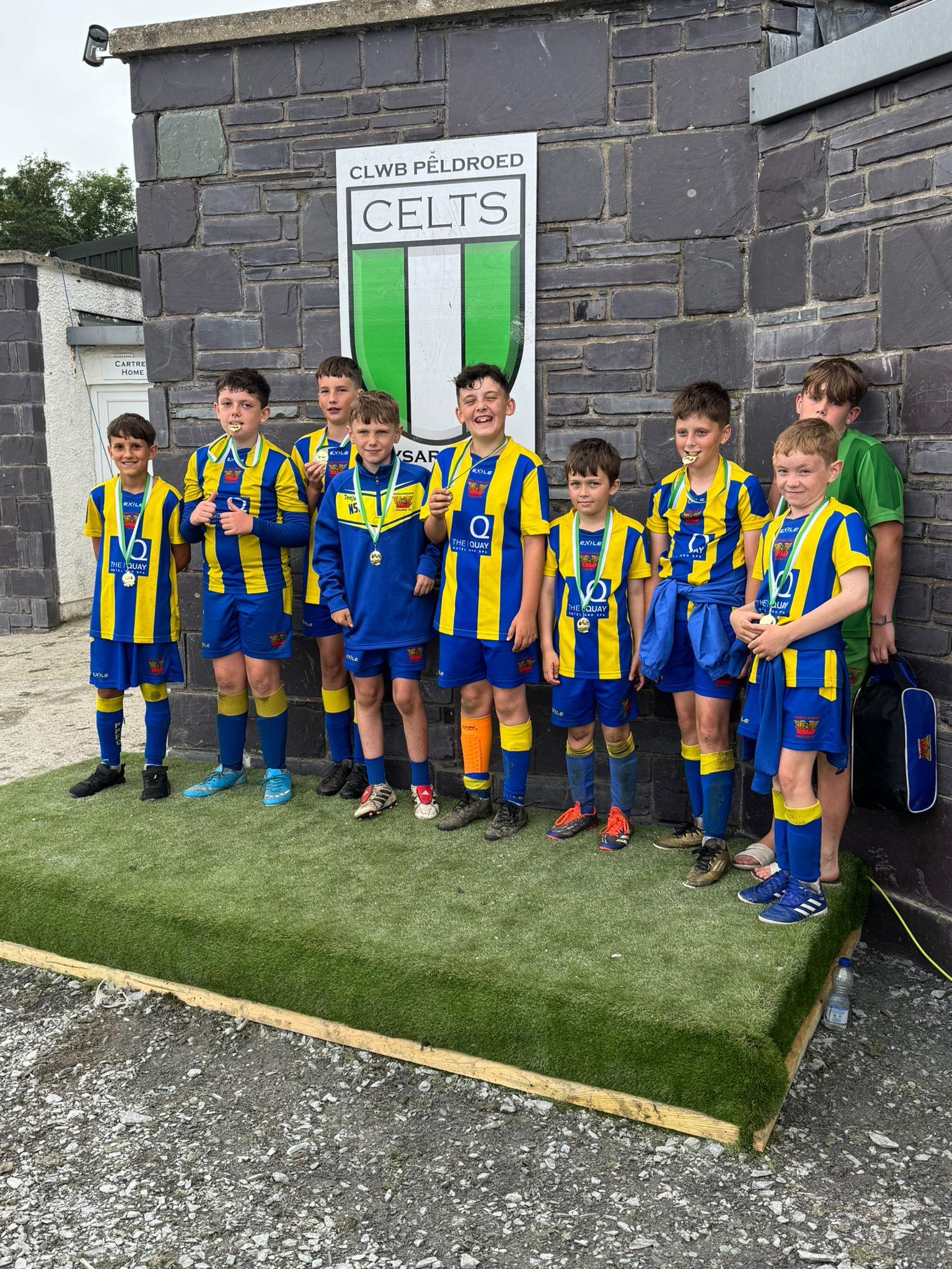 Phoenix junior players showing their medals