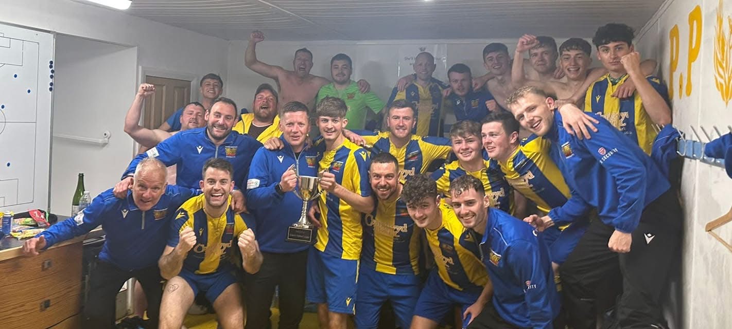 Dion Jones and the Phoenix reserve team celebrating their 2023 league title