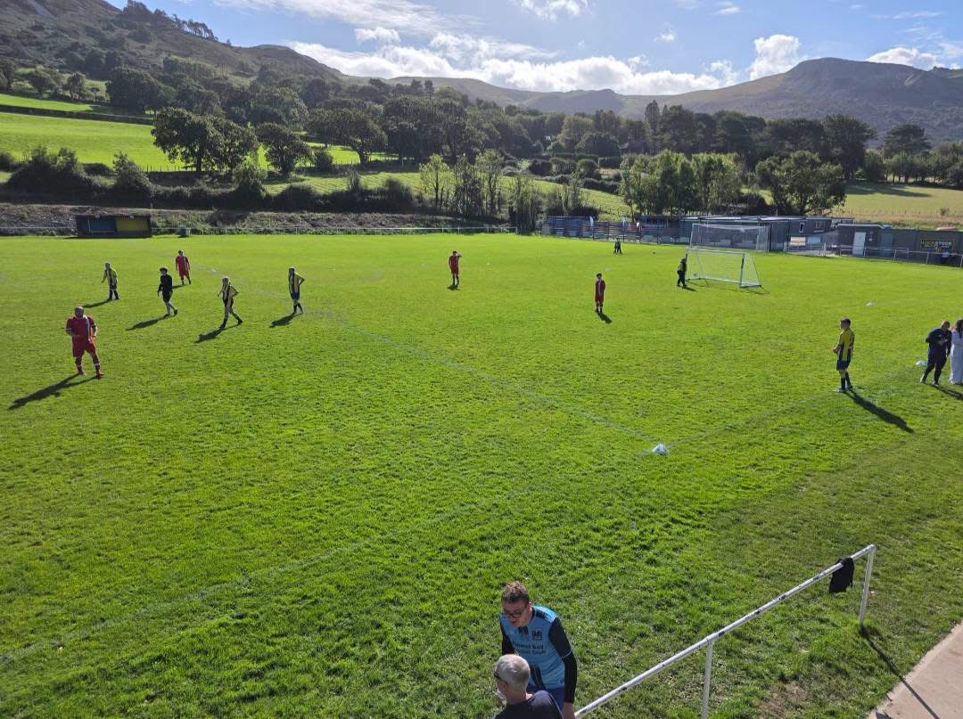 Round-robin football taking place on the pitch at Cae Sling