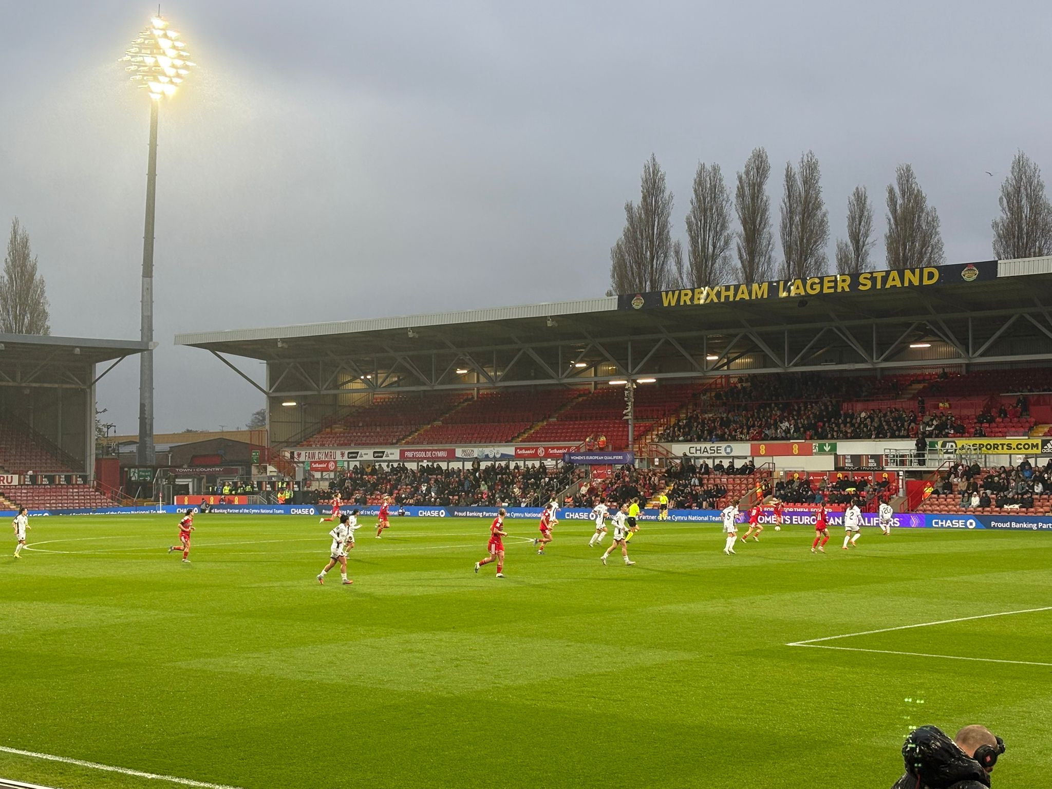PPFC girls and women in the crowd supporting Wales Women